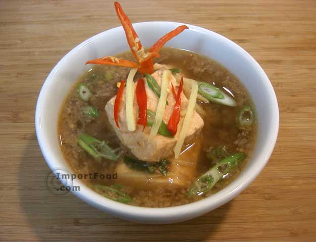 Salmon in spiced tamarind soup tom som pla salmon