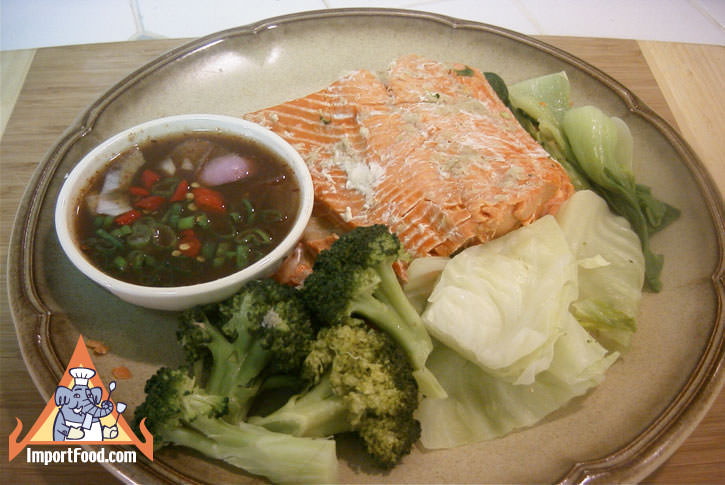 Steamed fresh fish and vegetables thai style with dipping sauce