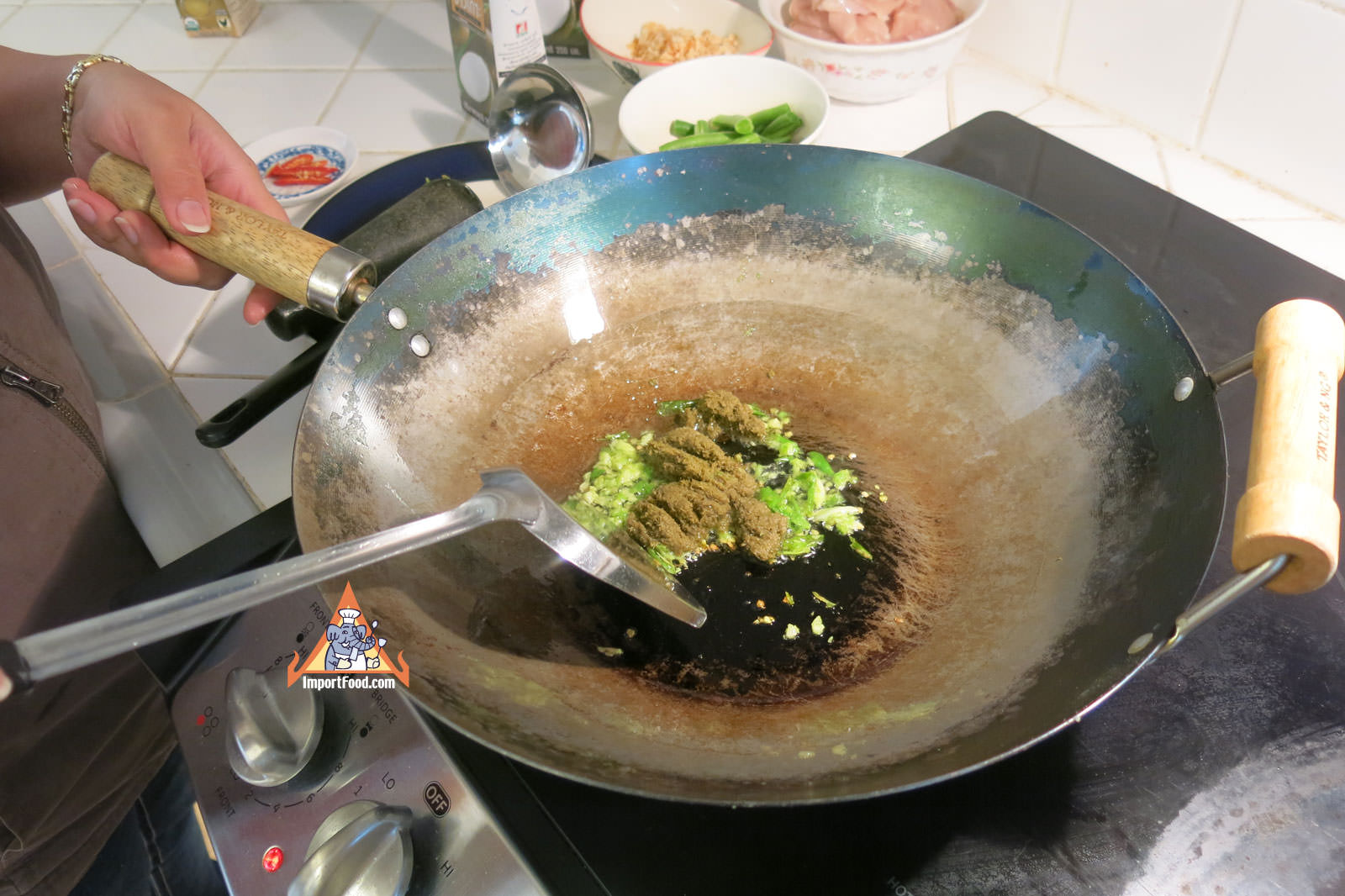 Fry fresh chiles and curry paste