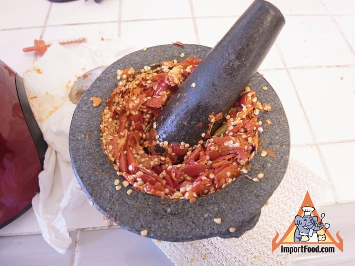 Ingredients pounded together in a mortar & pestle