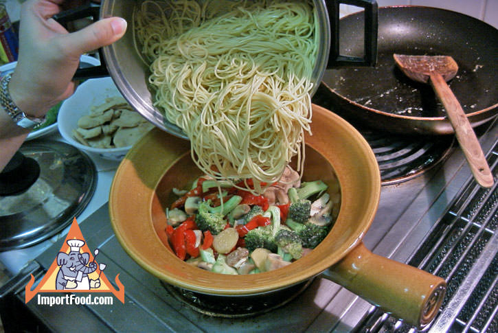 Add cooked noodles