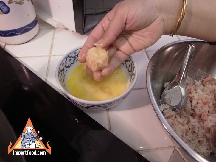 Dipping balls into beaten egg
