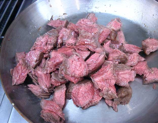 Fry sliced beef