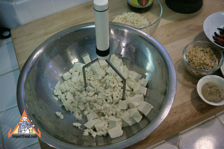 Mash boiled tofu