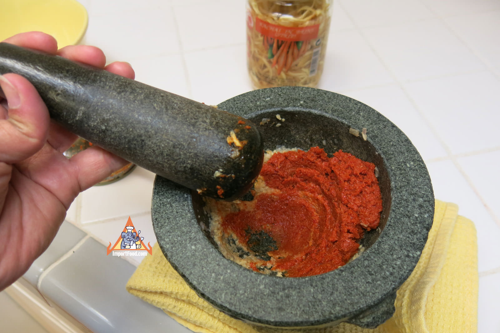 Red curry added to mortar