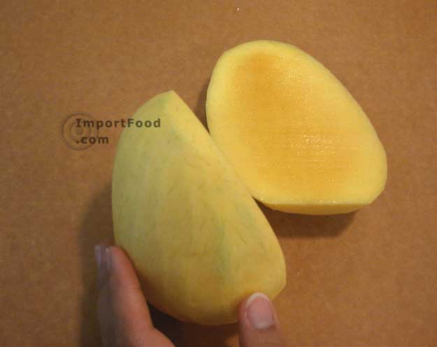 Set upright on flattened base and slice down to the right of center