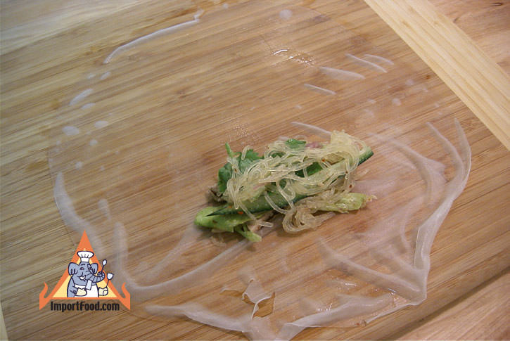Set wrapper down and larb on top