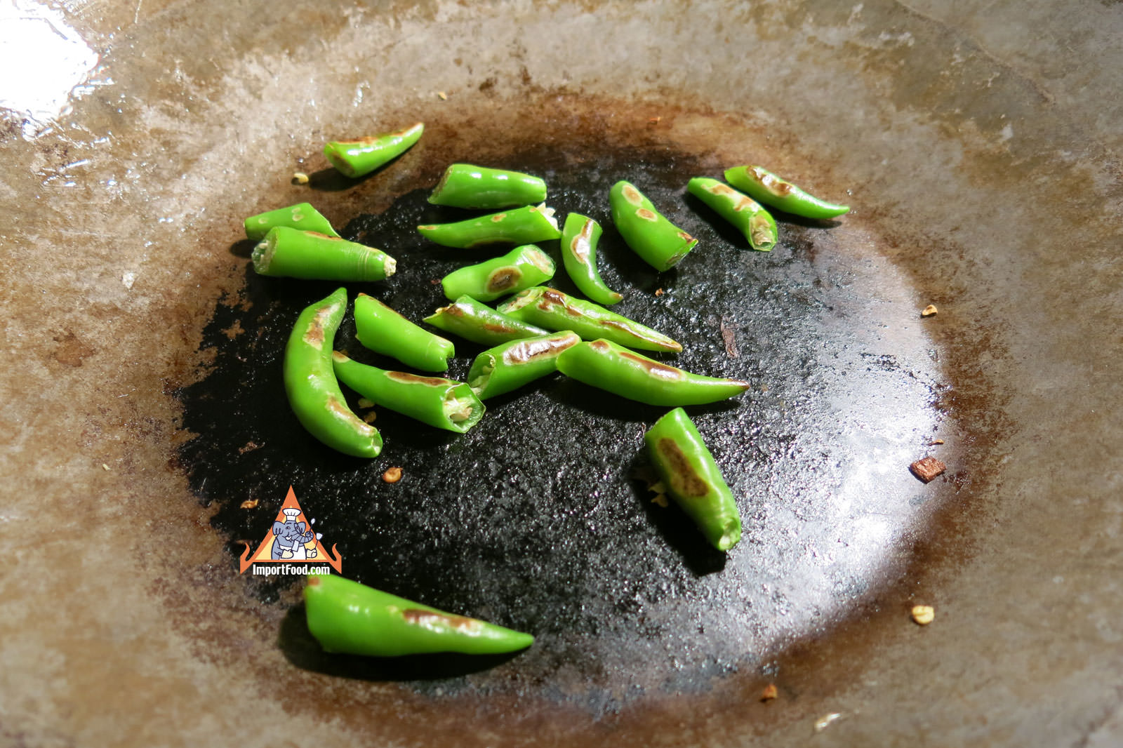Thai chiles on dry wok