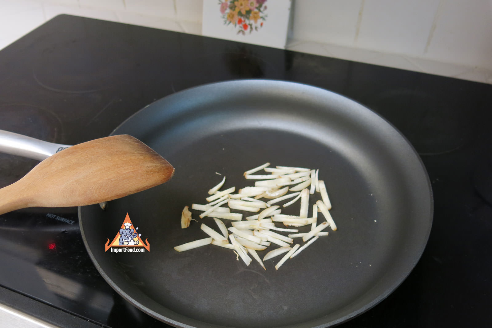 Roasting sliced galangal