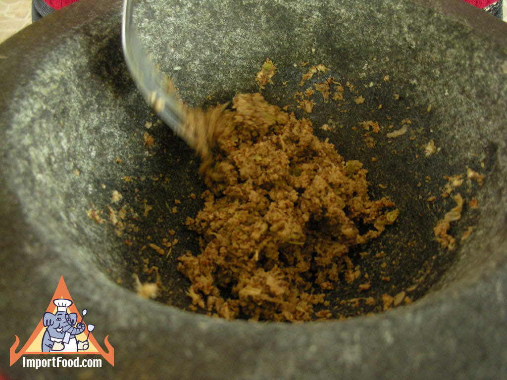 Coriander seed peppercorn and garlic pounded into a paste