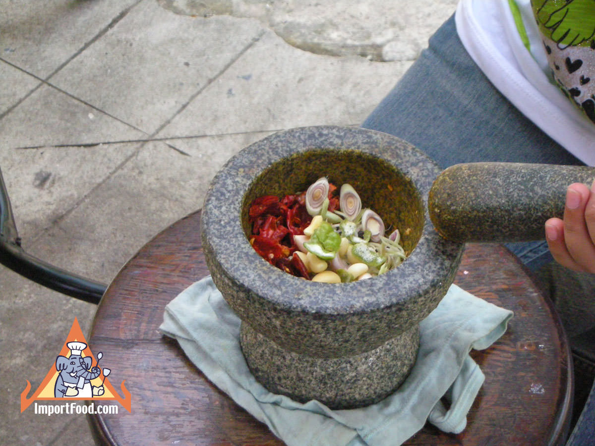 Pounding the chili paste