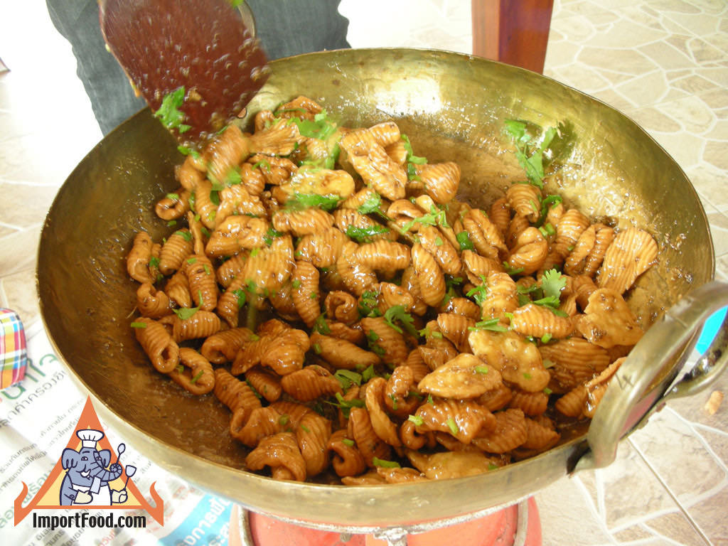 Shells palm sugar grounded paste and cilantro mixed together