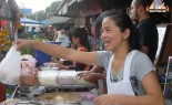 Thai Street Vendor prepares Bua Loi