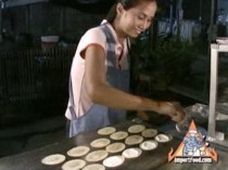 Street Vendor Prepares Khanom Buang