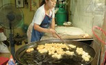 Bangkok Sidewalk Vendor Offers Thai Donuts, Pa Tong Ko