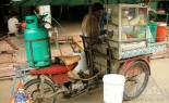 Thai Street Vendor Prepares Egg Noodle and Wonton Soup