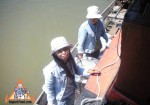 Selling Ice Cream on a River Boat in Thailand